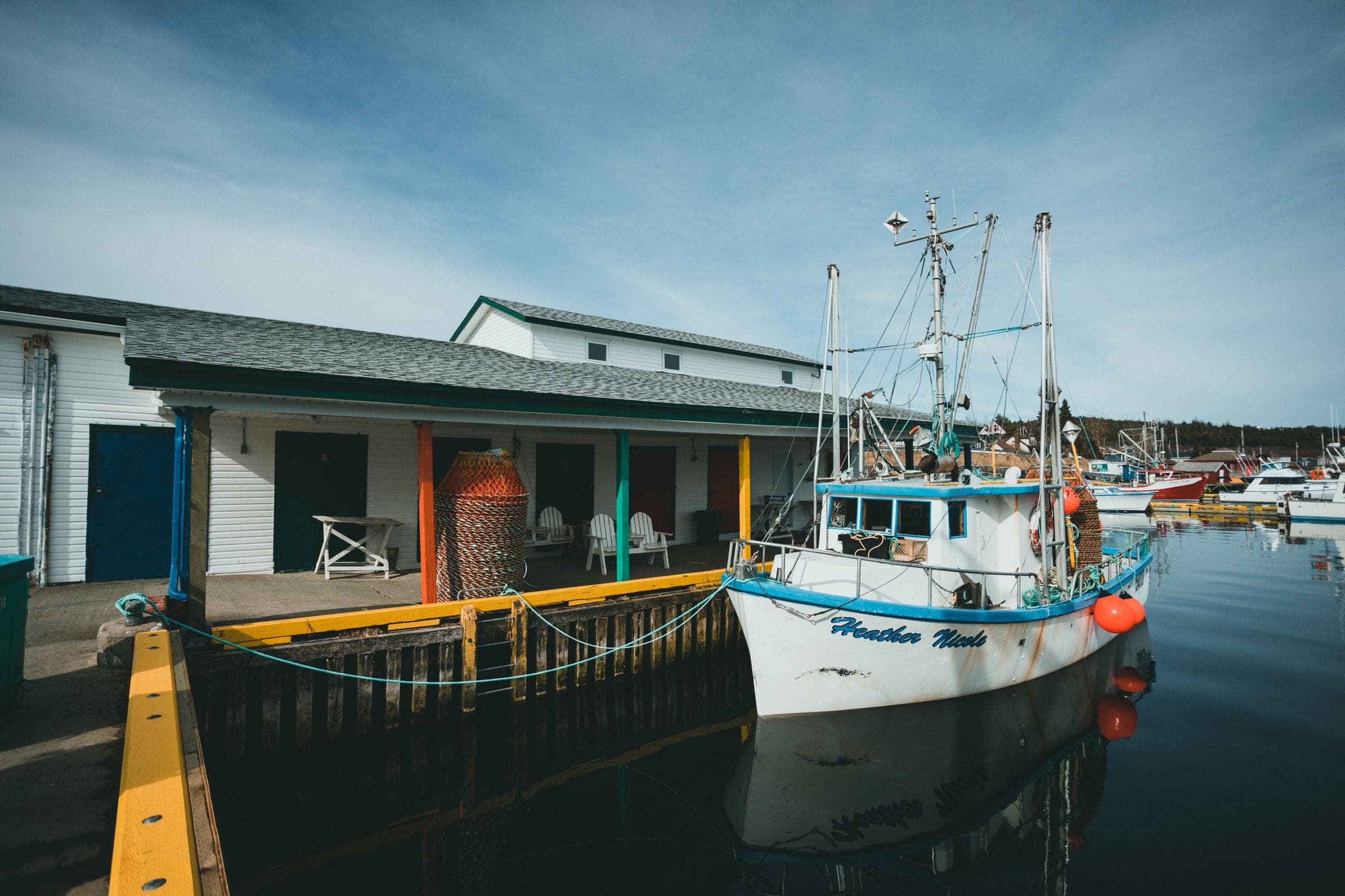 A fishing boat at a wharf in Shediac, NB where we do junk removal